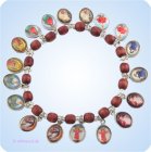 Armband mit Holz-Perlen und Hl. Motive 
